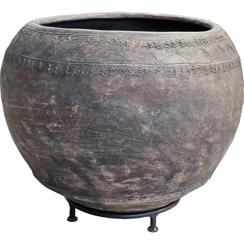 Clay planter pot on foot